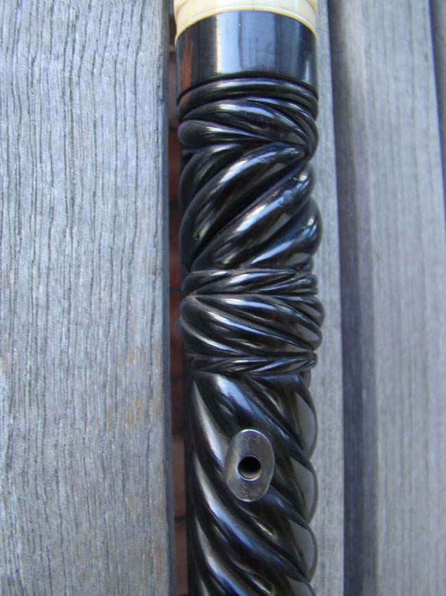 A RARE and beautiful 19th century American presentation walking stick with an eight sided scrimshawed ivory knob and a spiral twist entwined rope pattern dark rosewood shaft. — image 10